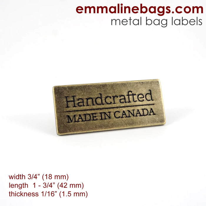 Metal Bag Label: "Handcrafted - Made in Canada"